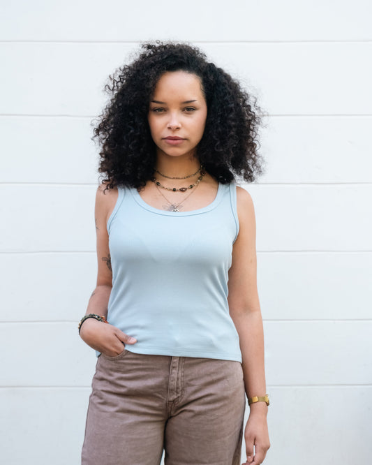 Top Femme textile souple et respirant